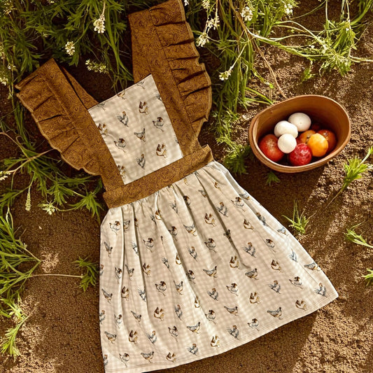 Apron dress chicken 6/7y